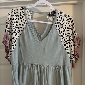 Stylish Women's Gray Top with Patterned Sleeves